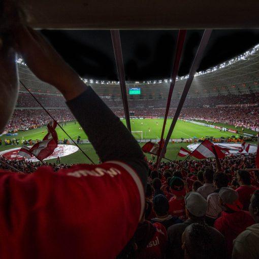 group of people watching soccer game