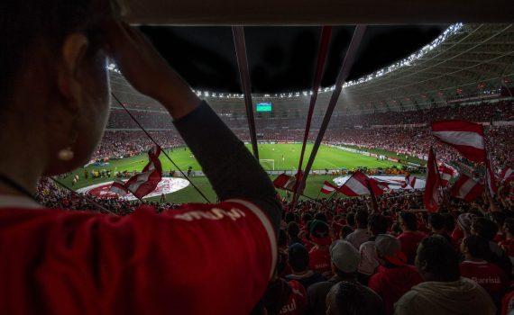 group of people watching soccer game