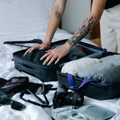 woman packing a suitcase