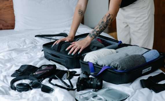 woman packing a suitcase